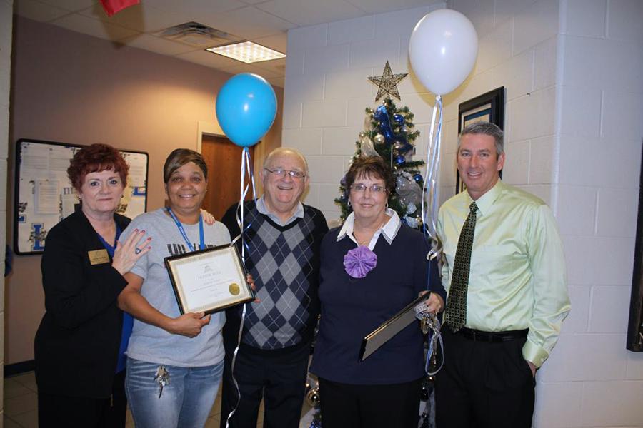 (LHS Honor Roll photo from left to right): LISD Education Foundation Parent/Staff Relations Committee Chair Judy Seifert, Lindale High School Custodian Barbara Calip, LISD Education Foundation Director Bernie Demers, LHS Family and Consumer Sciences Instructor Alethea Allen, Lindale ISD Superintendent Stan Surratt
 