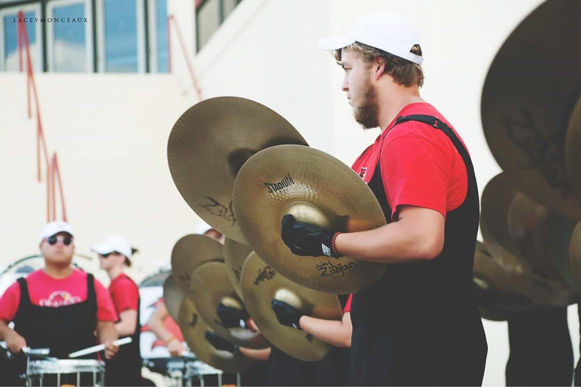 Tyler Burkham performs with the Lamar University Marching band during his freshman year at college