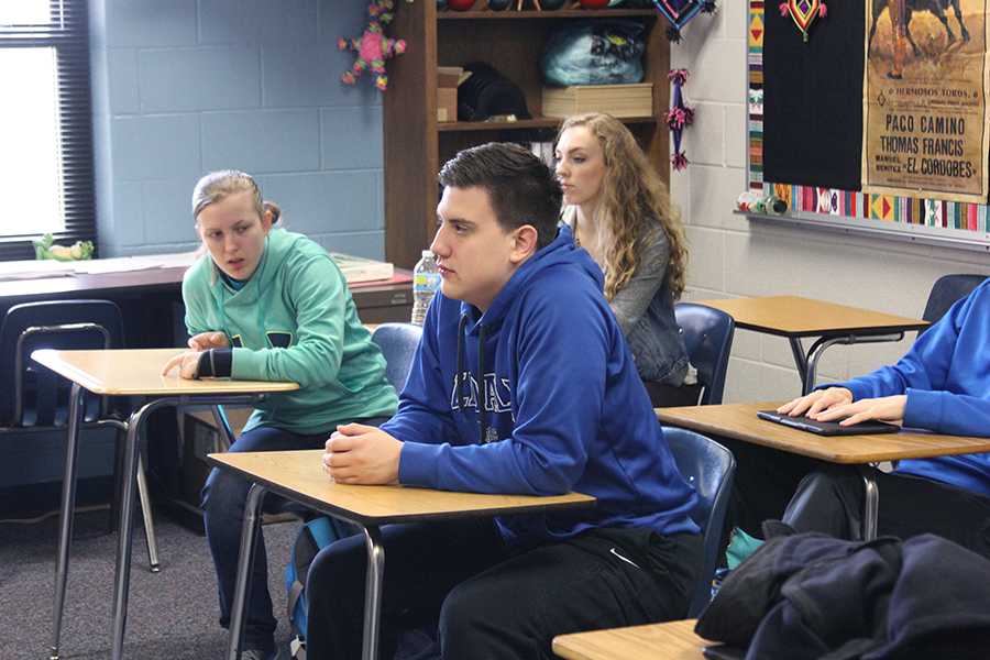 Junior Nathan Henson listens intensively in class. Henson was recently featured in the Tyler Today Magazine and is currently writing a sports-romance novel.