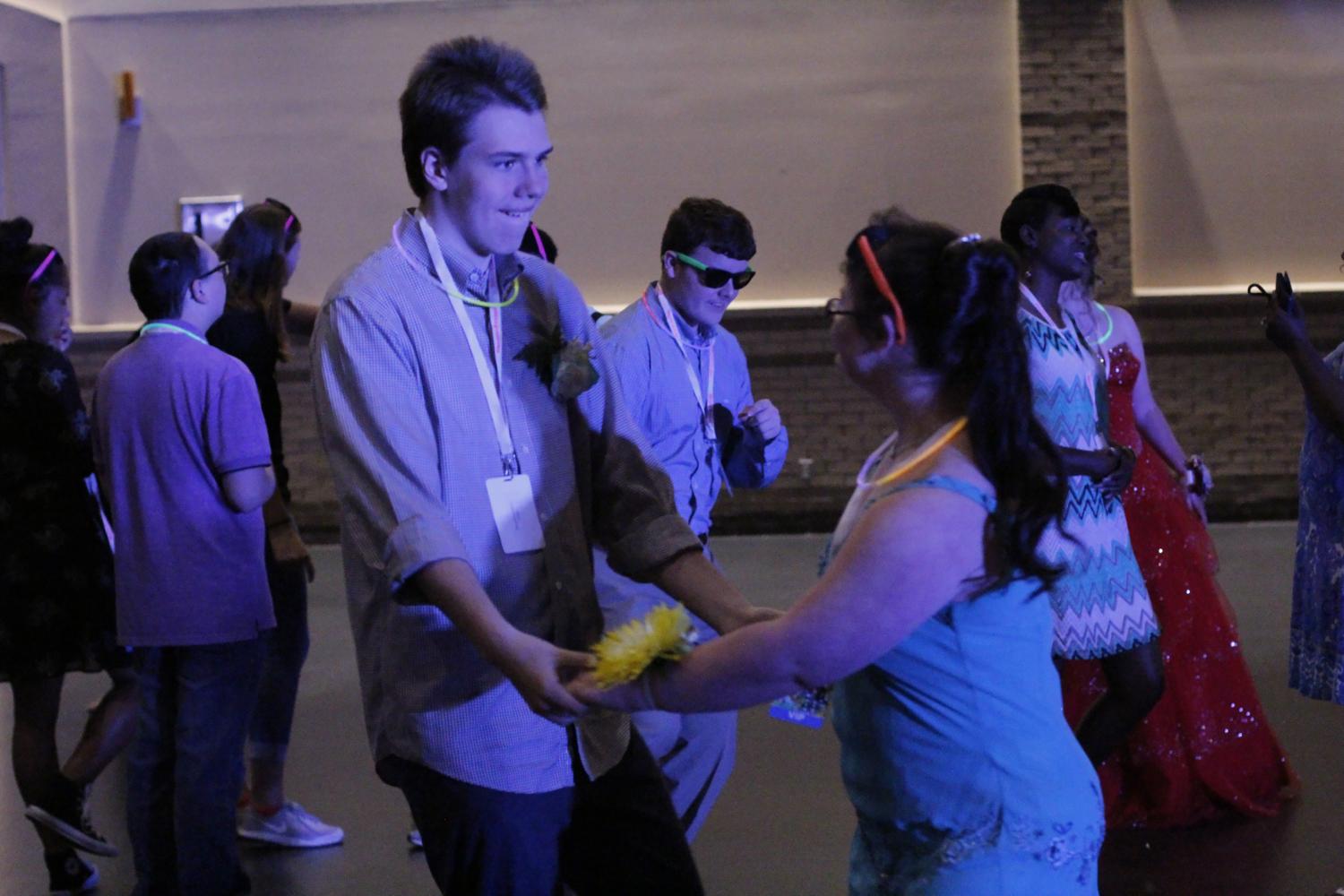 Students dance at special needs prom. Around 300 students from towns all across East Texas took part in the dance.