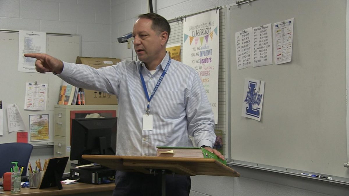 English teacher Jim Goode takes a question during his lecture. Goode taught in Singapore for 11 years before moving to Lindale.