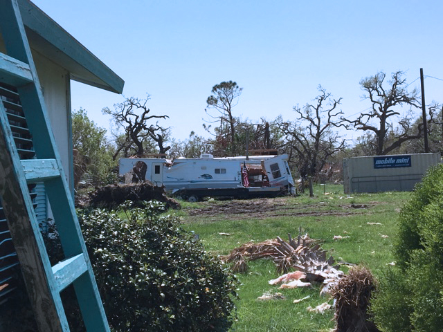 Surroundings of houses withstand damage from Hurricane Harvey. People and organizations from across the country traveled to the area to help those affected.