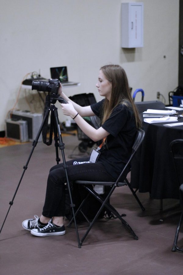 Sarah Huseth recording a segment for the Yamboree documentary. Huseth is involved in Audio Visual, Band and Yearbook.