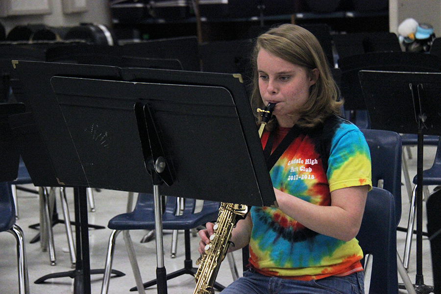Senior Celeste Herman plays her saxophone. She is rehearsing for Solo and Ensemble. 