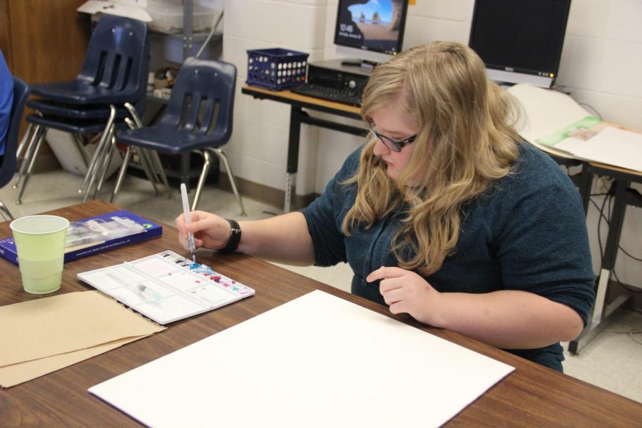 Danielle Harris begins painting for her VASE project. Harris will attend the VASE competition February 10.