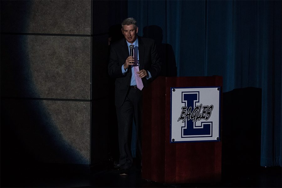 Superintendent+Stan+Surratt+speaks+about+the+Education+Foundation+during+Act+VII.+Act+VII%2C+a+production+that+showcases+talented+students+from+across+the+district%2C+is+the+Education+Foundations+largest+fundraiser+of+the+year.