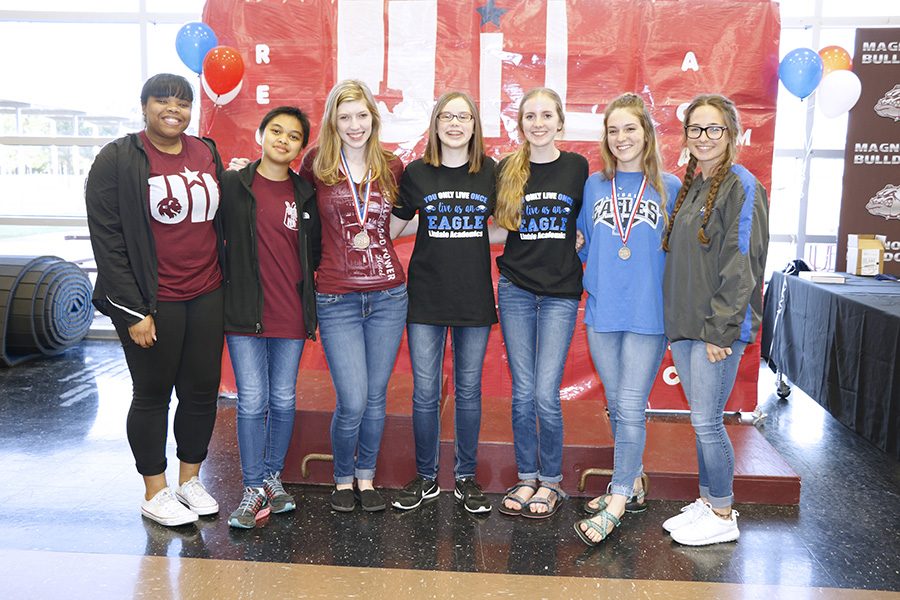 Lindale and Whitehouse teams pose together at the regional UIL meet last year. Seniors Adrienne Parks and Kate Mcleod advanced to state.