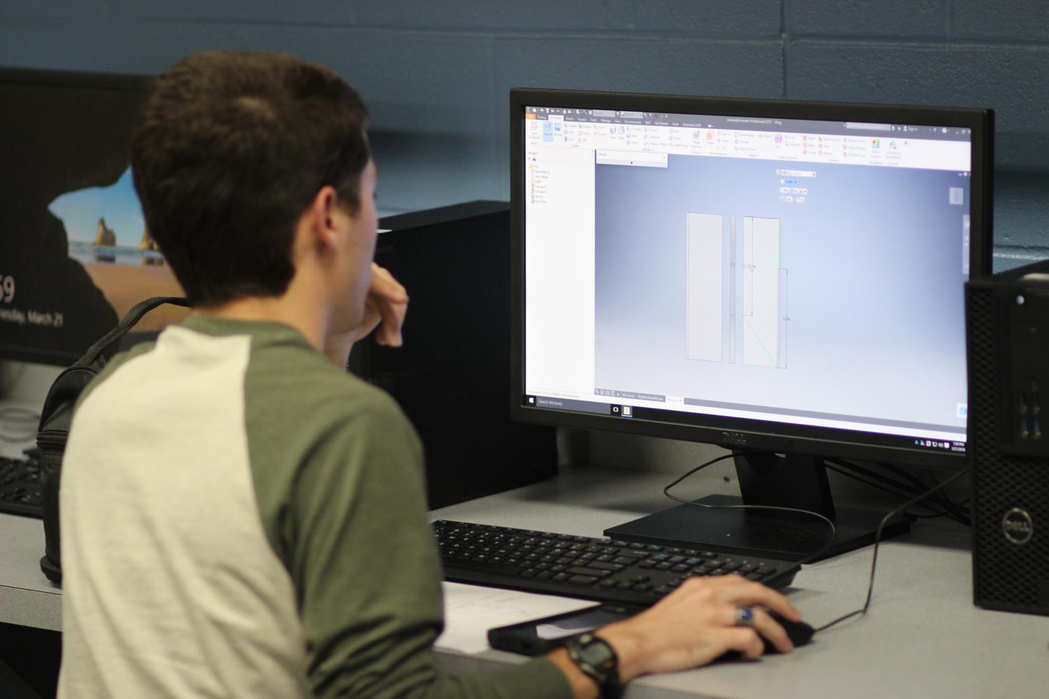 Senior Matthew Burns works on architectural design in Tonya Wheats class. Burns designed an anti-UAV defense system for the SkillsUSA competition.