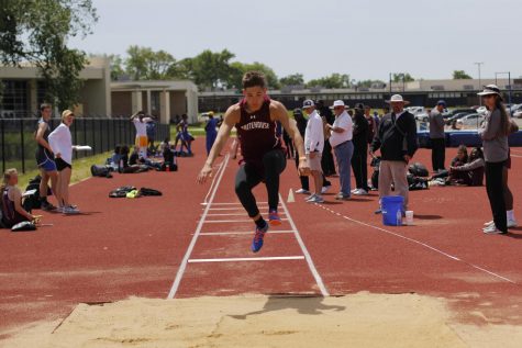 Track Competes at District