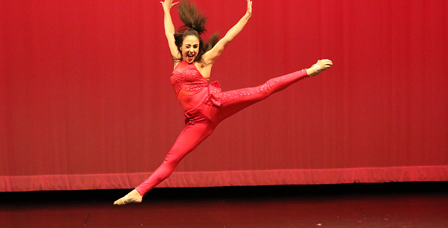 Senior Morgan Wishart performs a solo dance during the Spring Show. Wishart competed at MA Nationals with teammates Elizabeth Graham and Lainey Goodson.