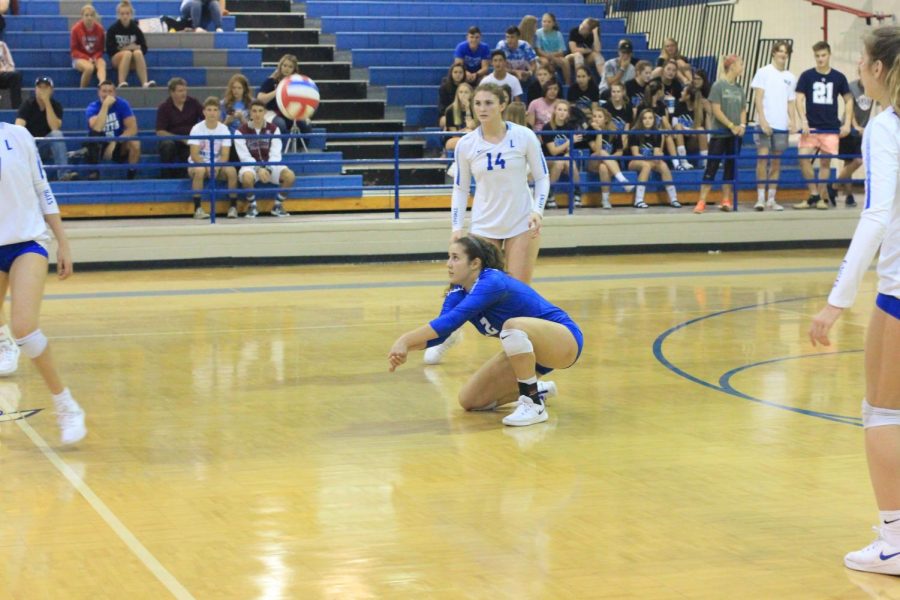 Senior+Jennifer+Moyer+prepares+to+pass+the+incoming+ball.+Moyer+has+played+volleyball+since+fifth+grade+and+is+the+captain+and+lead+defensive+player+for+the+Lady+Eagles+varsity+volleyball+team.+