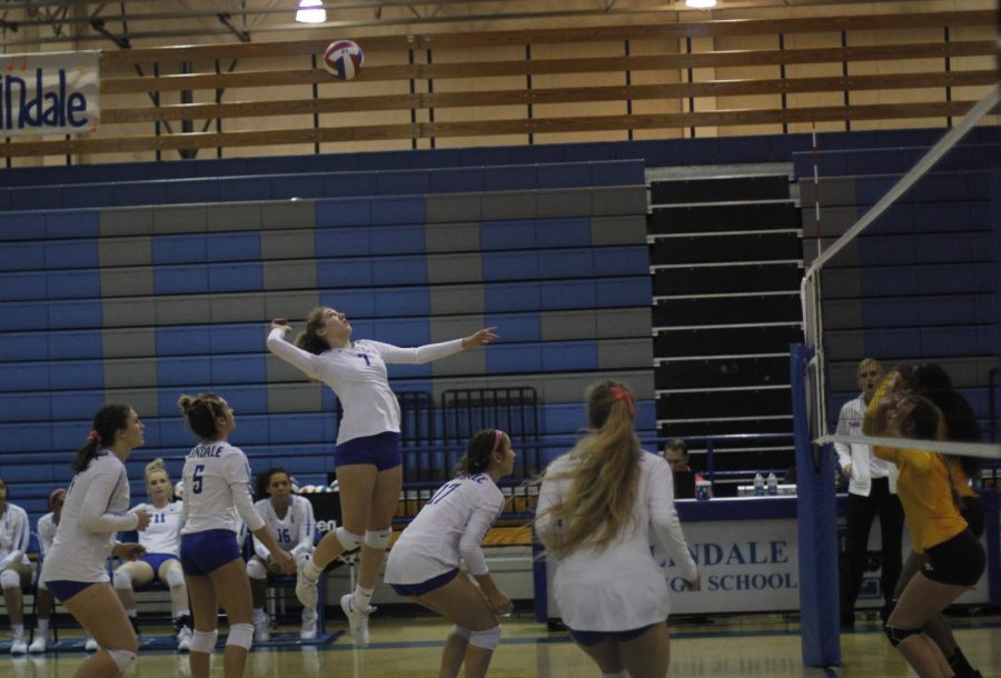 Sophomore Shelbi Steen sets up to quickly spike the ball over the net. Lindale made a clean sweep of Mt. Pleasant with each team winning in straight sets.