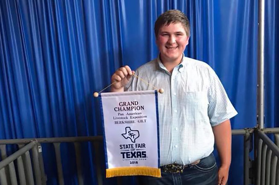 Junior Wins State Fair With Prize Pig