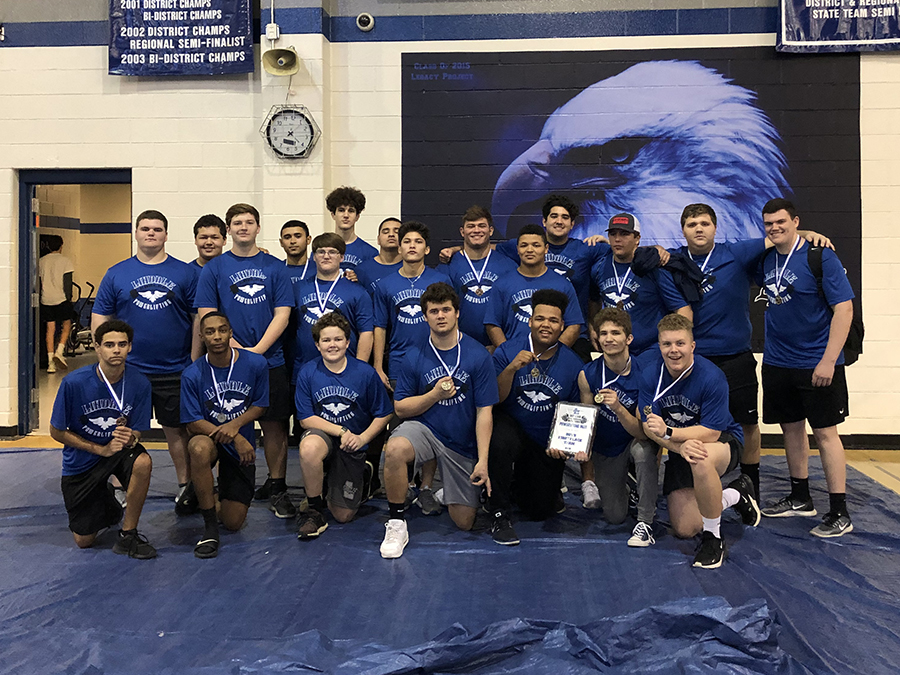 The boys powerlifting team wins first overall. Twelve boys placed in the top five with five of the lifters placing first.