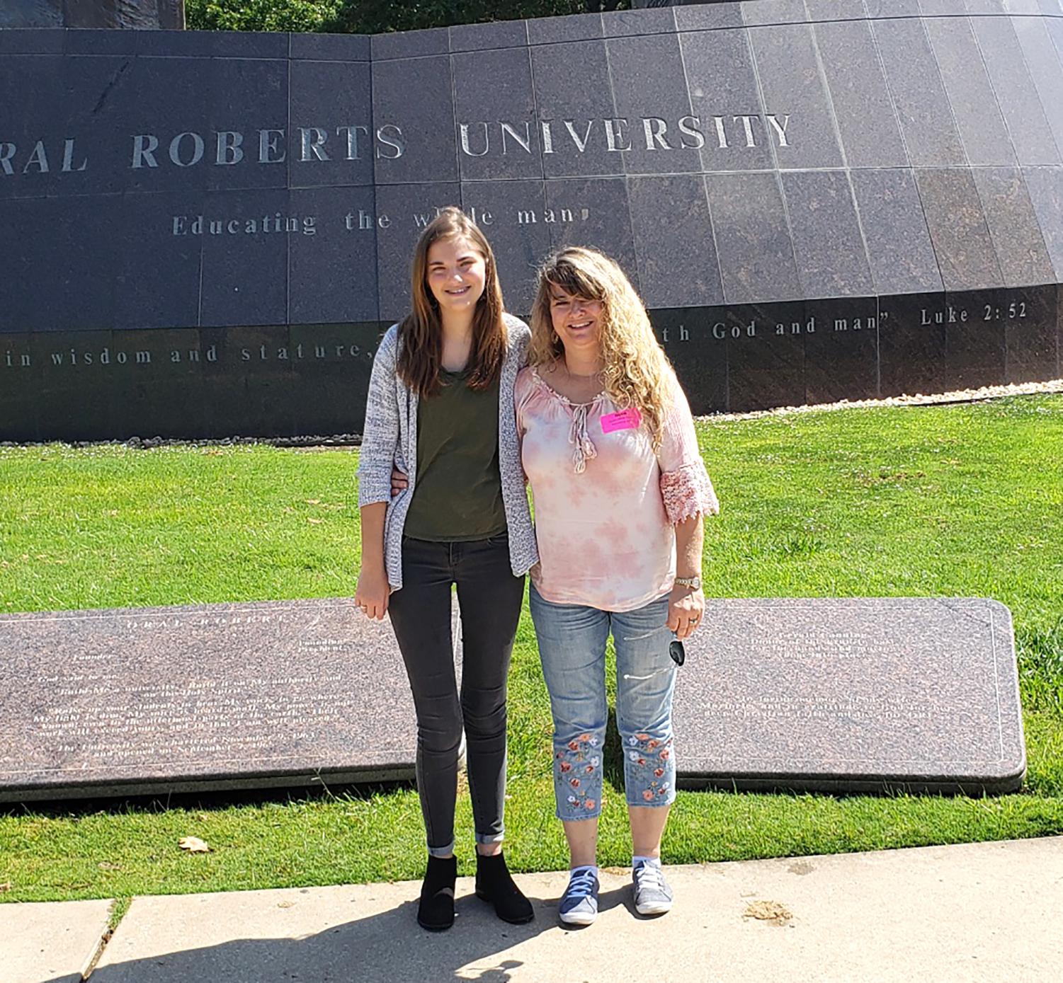Barrington and her mother pose for a picture at Oral Roberts University. She plans to attend the university after graduating high school.