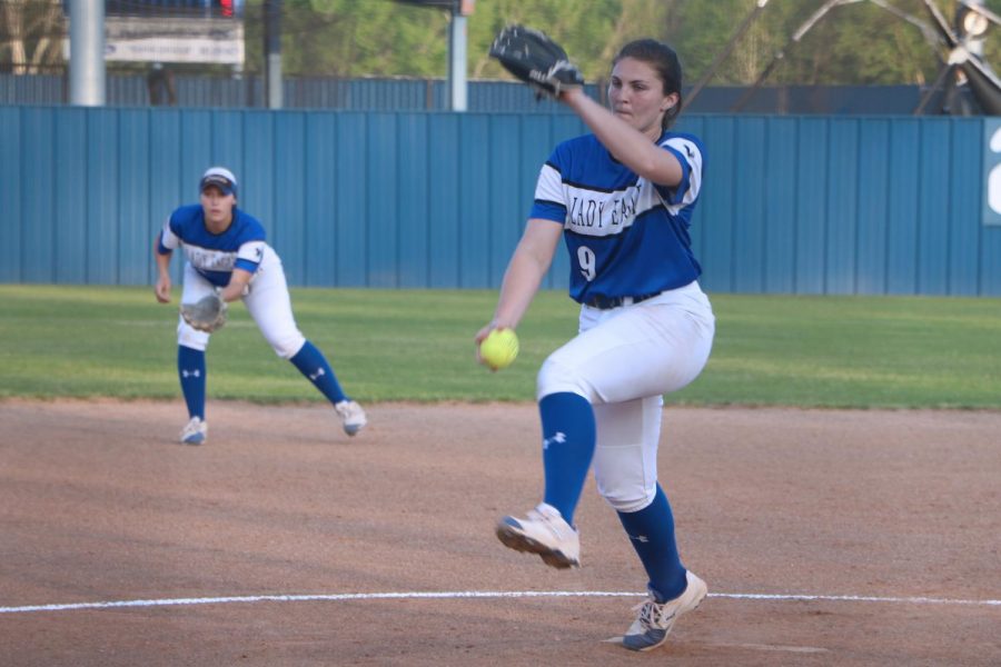 Senior Hannah Knox winds up to pitch the ball to an opposing player. The varsity softball team will play their bi-district game Thursday against Hallsville after clinching a spot Friday.