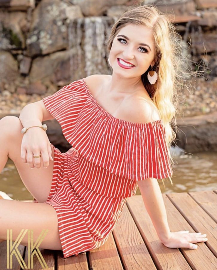 Senior Lainey Goodson smiles during her Fourth of July shoot. This is one of her rep programs stylized shoots. 