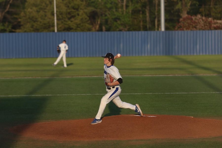 Senior Landon Chaney pitches the ball to a Sulphur Springs batter. The Eagles varsity team won the game 4-1 and also beat Sulphur Springs three games to none in their district series.
