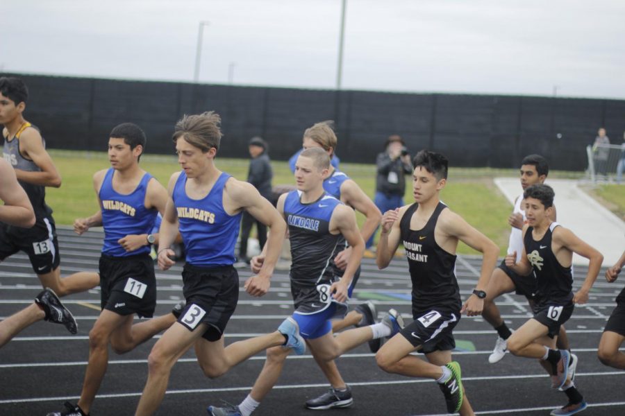 The track team competes at district in Royse City. 