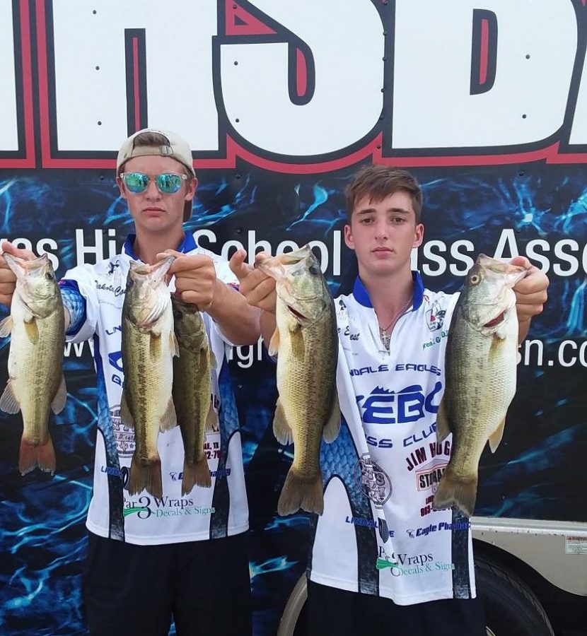 Dakota Cook (left) and Bryce Everest (right) posing with their fish. They scored 10th place out of 127 teams with an end-weight of 7.95 divided amongst 5 fish.