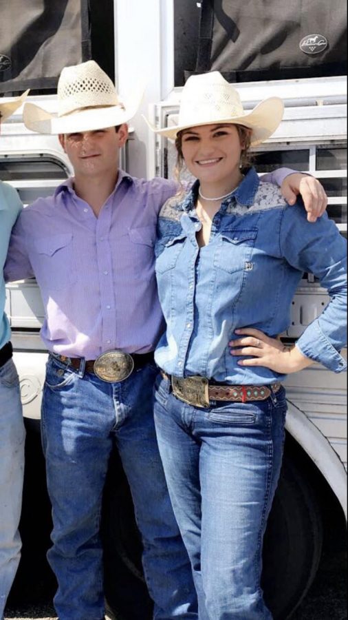 Ty Roach and Kristen Riley outside their trailer. They won the ribbon roping contest.

Photo Courtesy of Kristen Riley.