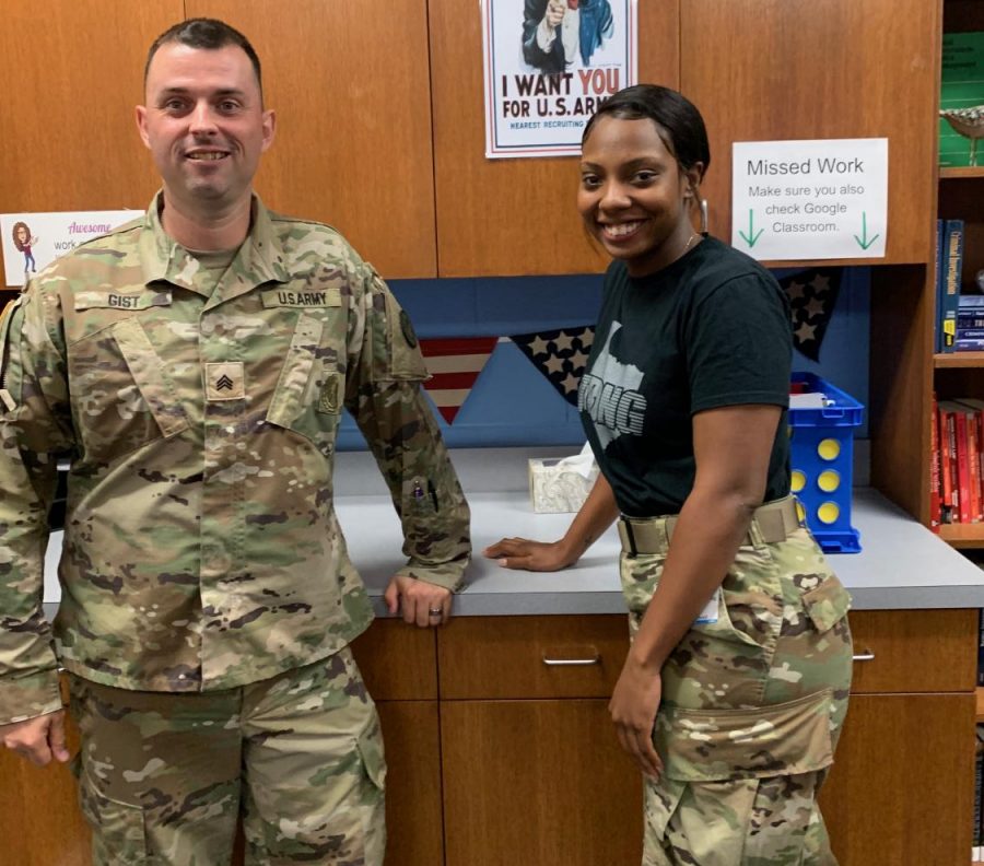Sergeant Gist and Specialist Browning pose for a picture after speaking to the Law II classes. They are members of the Texas Army National Guard.