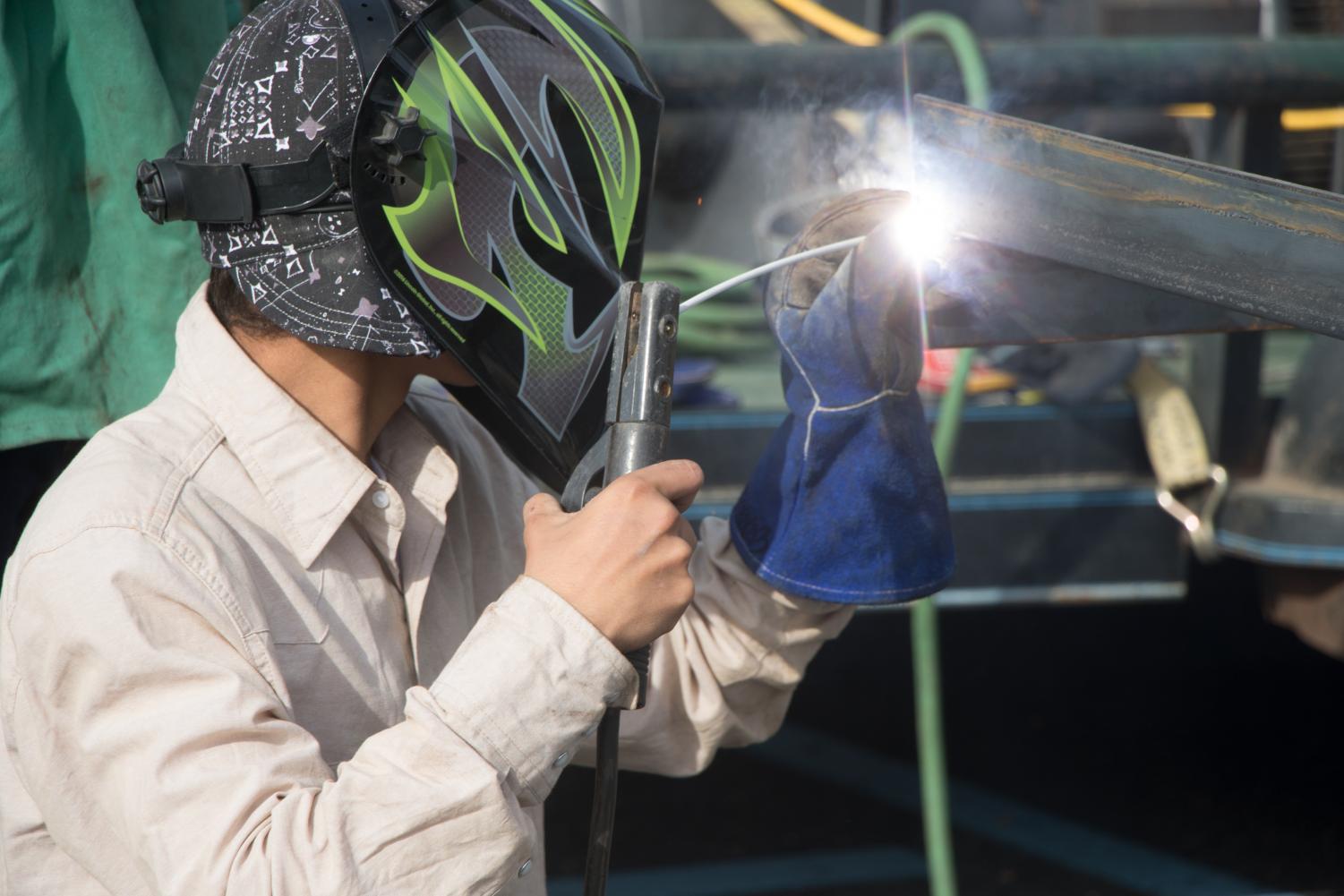 Student welds pieces of trailer together during competition. This build off involved seven schools as well as Lindale.