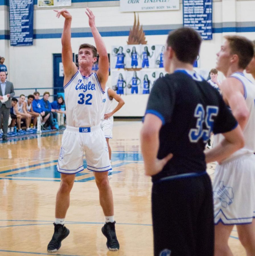 Senior+Jacob+Koeshall+shoots+a+free+throw+in+the+game+against+Grace+Community.+The+point+from+this+shot+counted+as+his+1000+point+in+his+career.