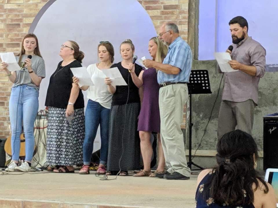 Junior Brooke Estes, her youth group and a few adults sing the song “Kind of My Heart” for the pastor’s church in Catarina, Nicaragua. The pastor and his wife were the hosts of the event.