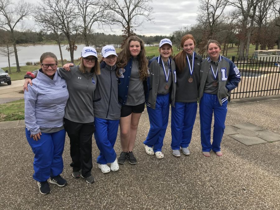The girls golf team poses fora picture following their third place finish at the Garden Valley meet.