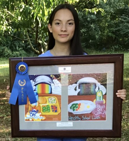Sophomore Mariana Martinez presents her art work.
