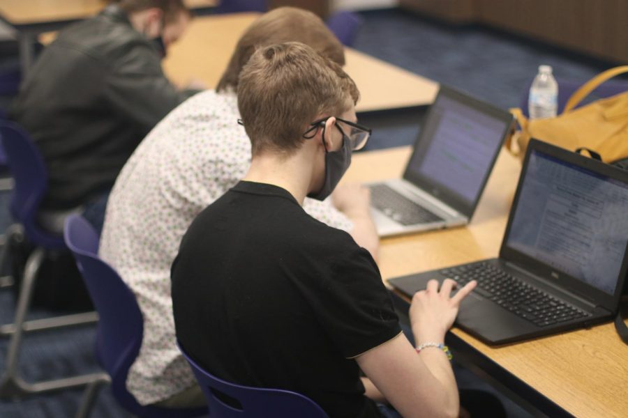 Senior Phoenix Pittman compiles evidence for his next debate tournament. Pittman founded the Online Debate Institute that ran last summer.