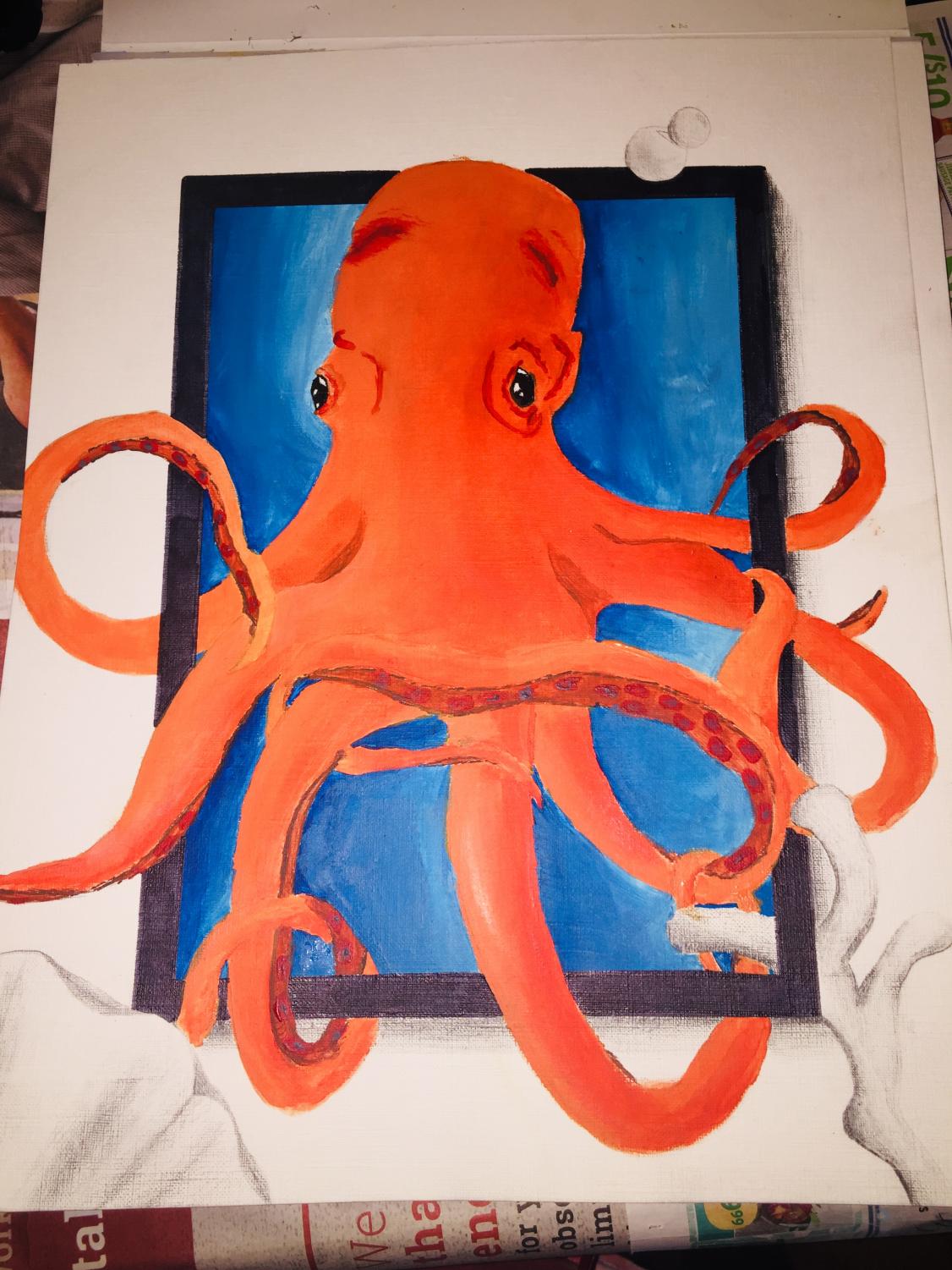 This is an octopus created with acrylic paints and with graphite on the outside.