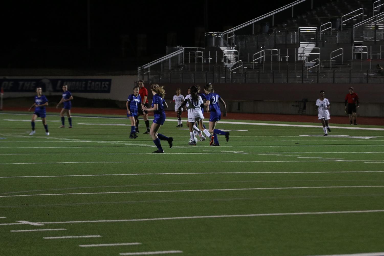 The Varsity girls soccer team plays against Cumberland. They won 8-0.