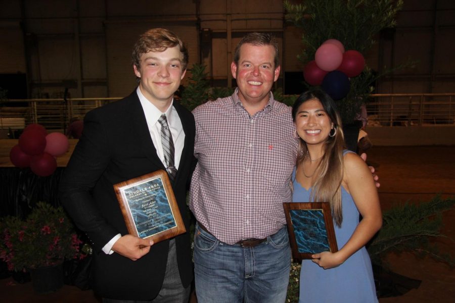 Seniors Janet Allen and Rebekah Beard stand next to principal Jeremy Chilek. The two were awarded the Chamber of Commerce Student of the Year Award earlier this month.