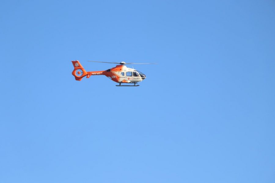 The EMT helicopter flies in from UT Health.  