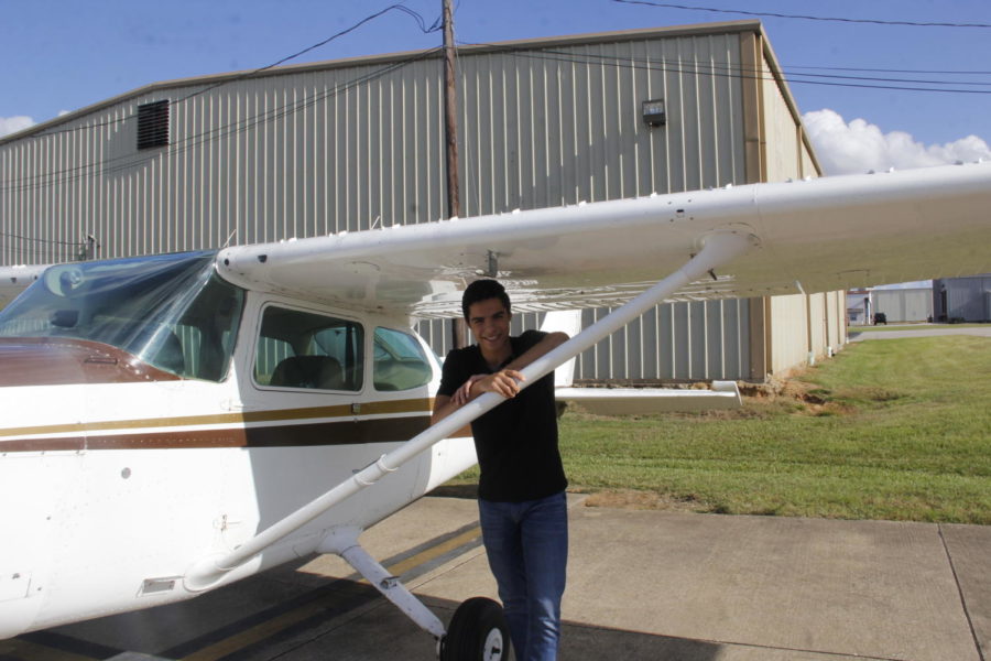 Sophomore+Henrique+Arantes+poses+with+his+plane.+Its+a+really+great+experience+to+be+able+to+fly%2C+Arantes+said.