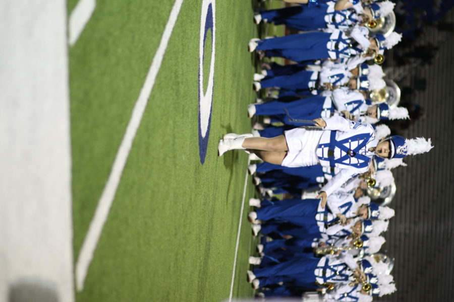 Ussery marches for a Friday night performance.