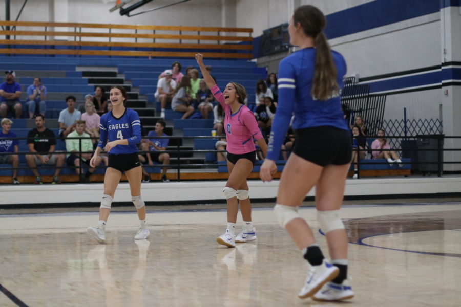 Senior Alondra Romero cheers after  her team scored a point.