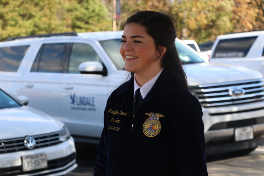 Junior Jacqueline Rand speaks to the FFA students before departing for state.