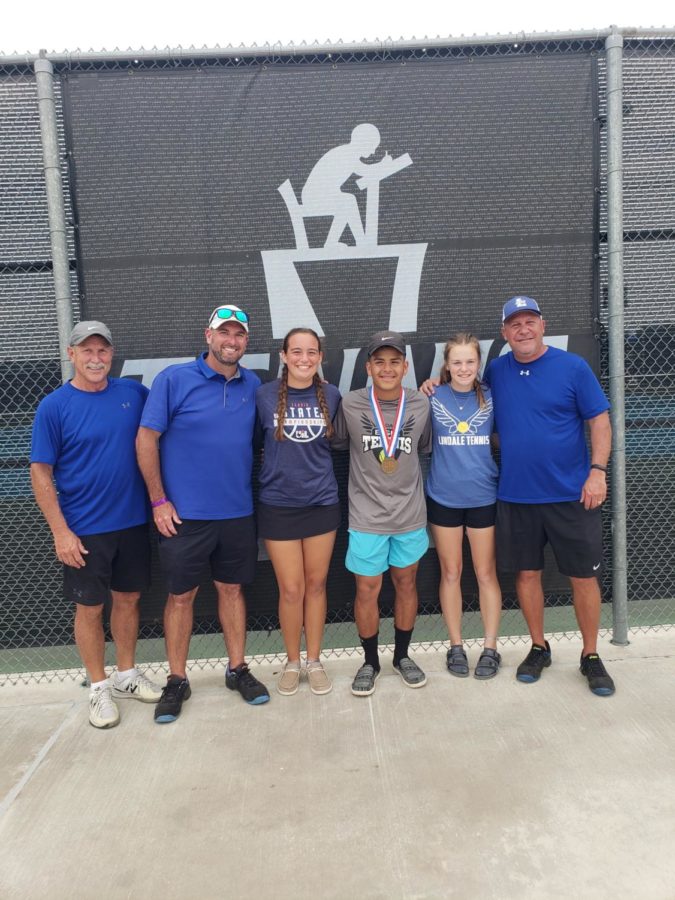 From left to right: Coach Anders, Coach Namanny, junior Taegan Michel, sophomore Emilio Rodriguez, freshman Breanna Taylor, and Coach Rodgers. Taylor and Michel qaulified in state for girls doubles and Rodriguez is a boys singles sstate semi-finalist.
