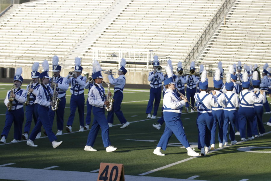 The band performs their box drill at the UIL contest. It is important to be precise, sophomore Keren Lee said. If we do just like how we have been practicing, I think well have a good chance at state.