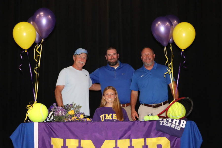 Bailee Lane poses with her tennis coaches at the signing table. She will be attending Mary Hardin Baylor.