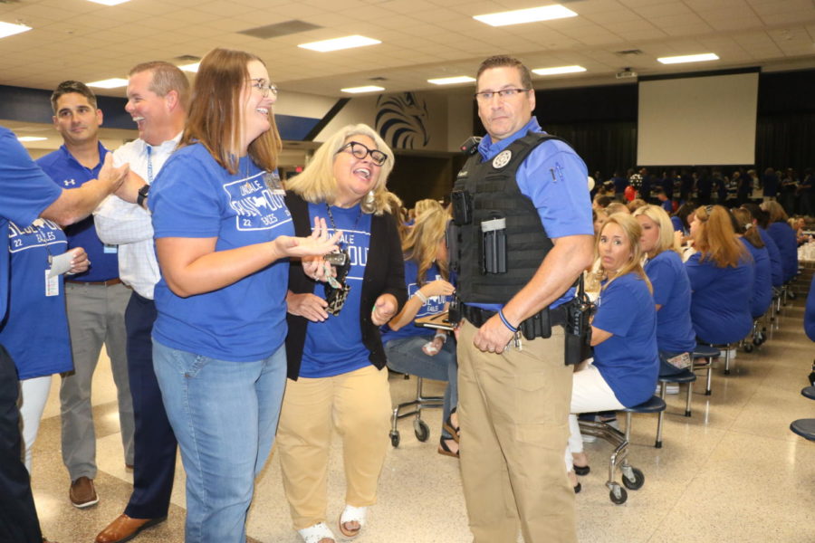 Teacher Lindsay Kelly talks to Officer Dewolfe at the annual teacher lunch. Like all the other teachers in our amazing school district, Kelly said. I just love our community and want what is best for it. 