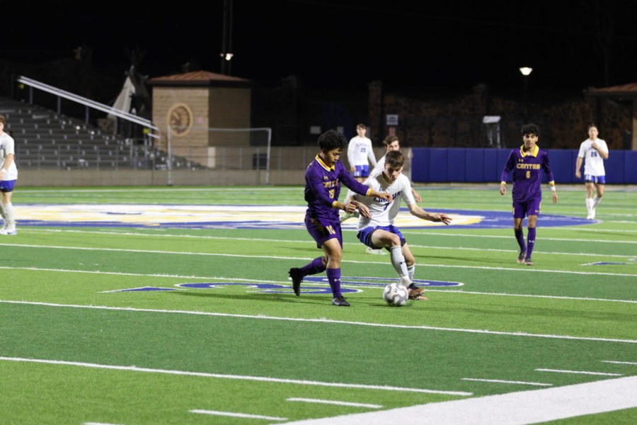 The boys varsity soccer team plays against Henderson in the second round of playoffs.