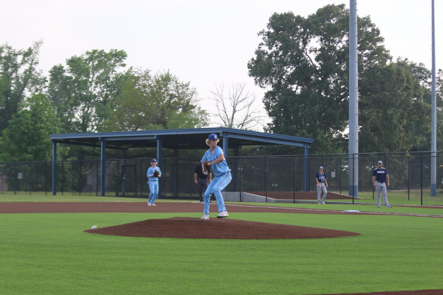 Sophomore Hudson Legrow pitches at the varsity baseball game.