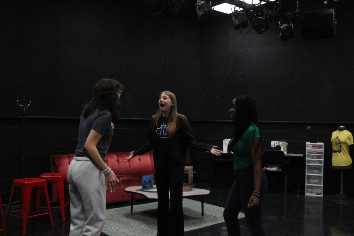Sophomore students rehearse in theater class.  
