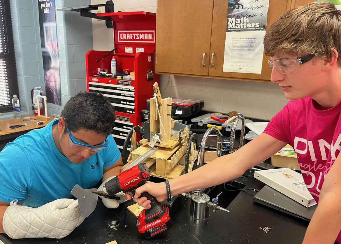 Juniors Greyson Cassity and Christian Mata work together on teams project.