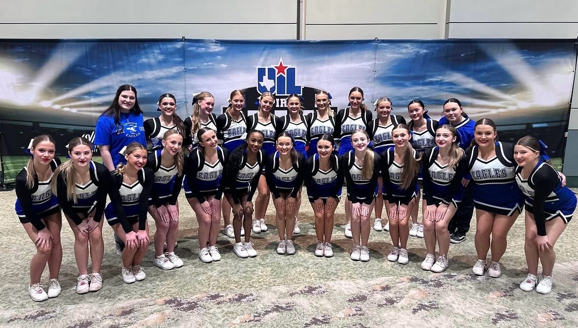 The cheerleaders pose at the state competition in Fort Worth. I had such a fun time being able to compete and spend time with my friends, junior Reagan Hope said.
