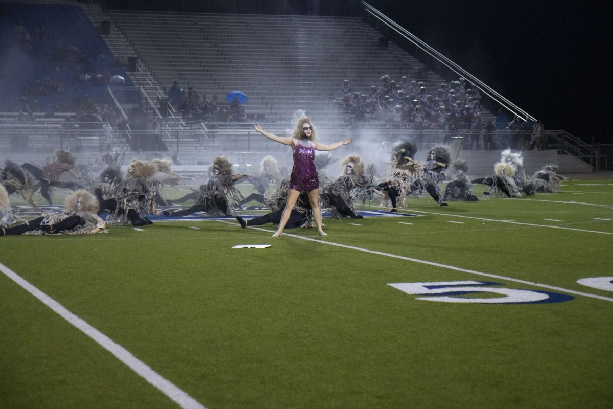 The drill team performs a routine to Thriller by Micheal Jackson at half time. This dance is performed every year on the friday before halloween.  